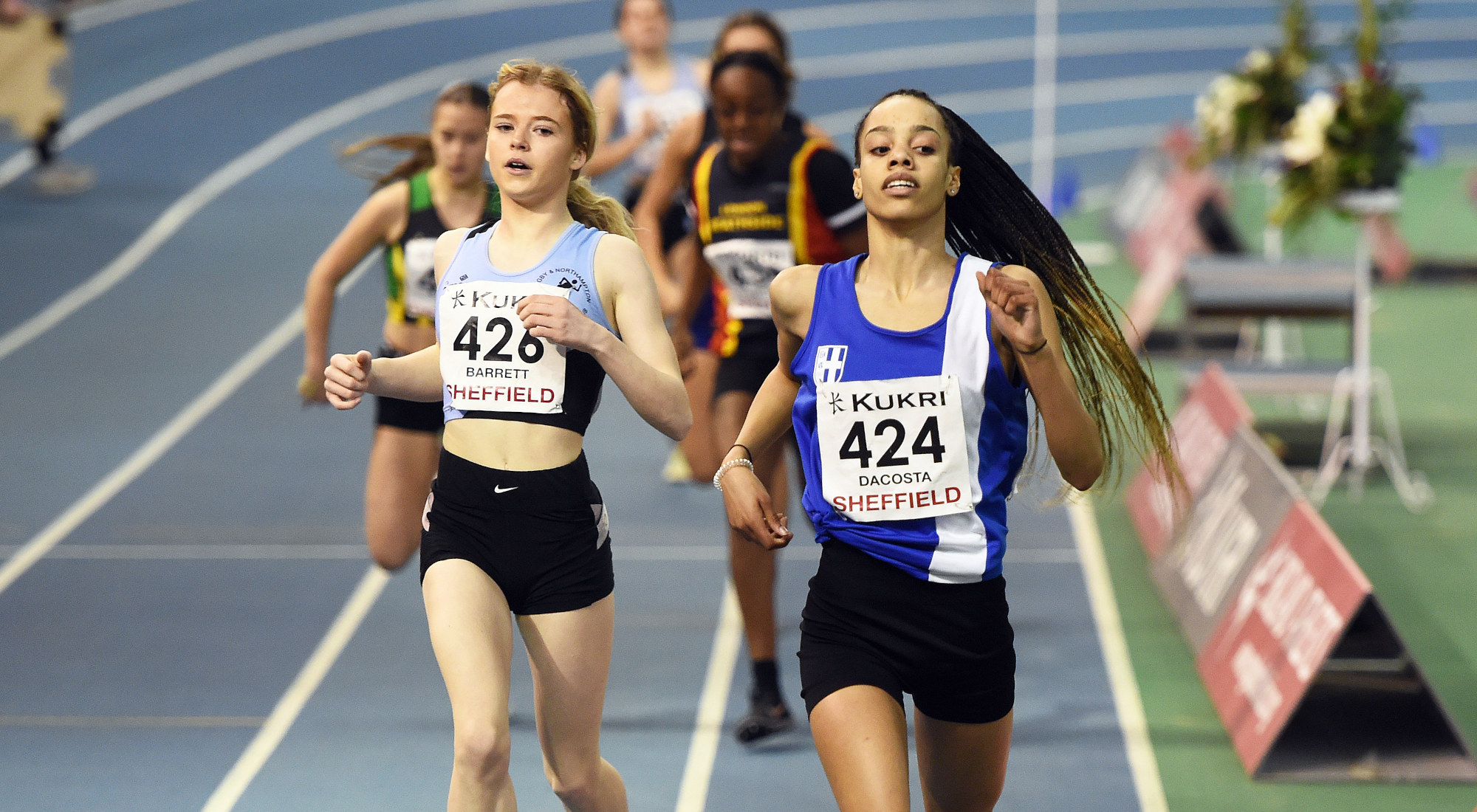 Kara DaCosta (424) wins the U17 women's 300m in Sheffield