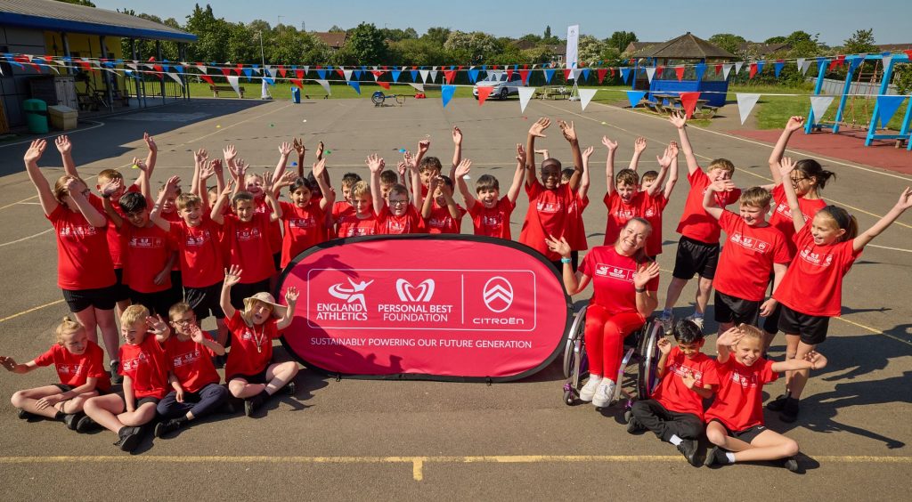 group of school children and Hannah Cockroft at Citroen partnership launch