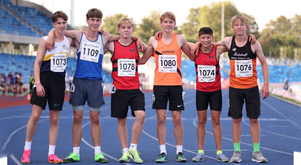6 club athletes standing on track at England champs