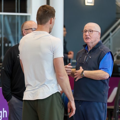 Coach talking to Thomas Roehler at javelin masterclass